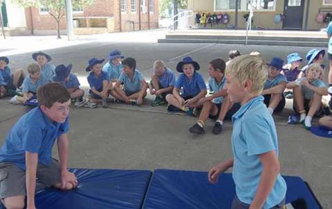Two players about to start  wrestling