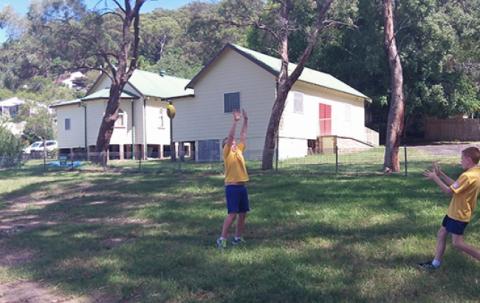 AFL:He has got a mark and about to kick a smash