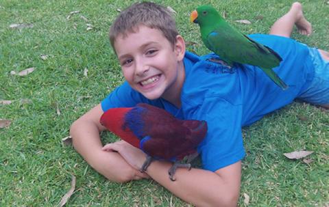 Kevin playing with his bird